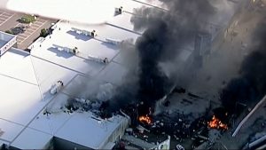 Plane crashes into shopping centre near Melbourne